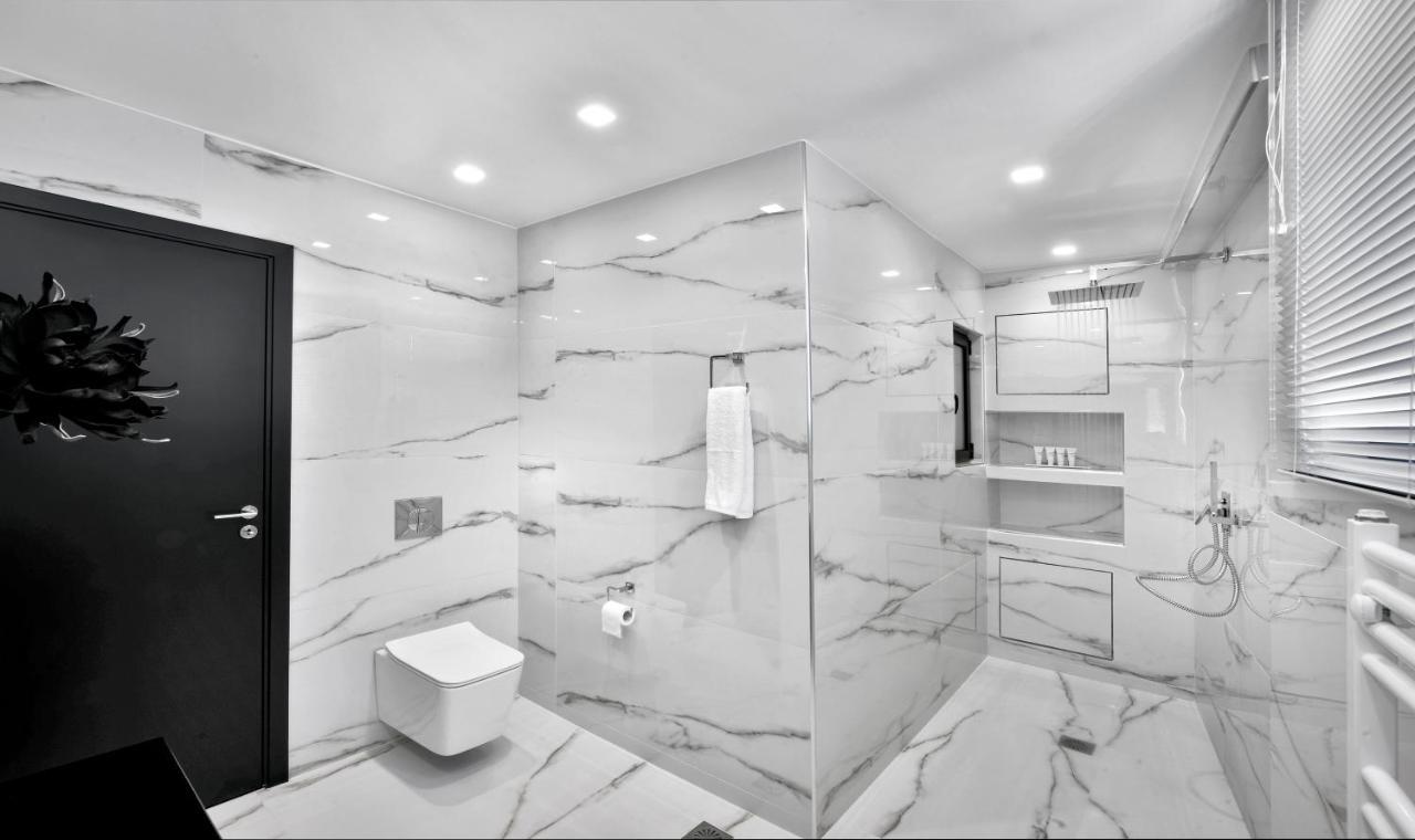 Ater Albus By K&K Aparthotel Athena Bagian luar foto